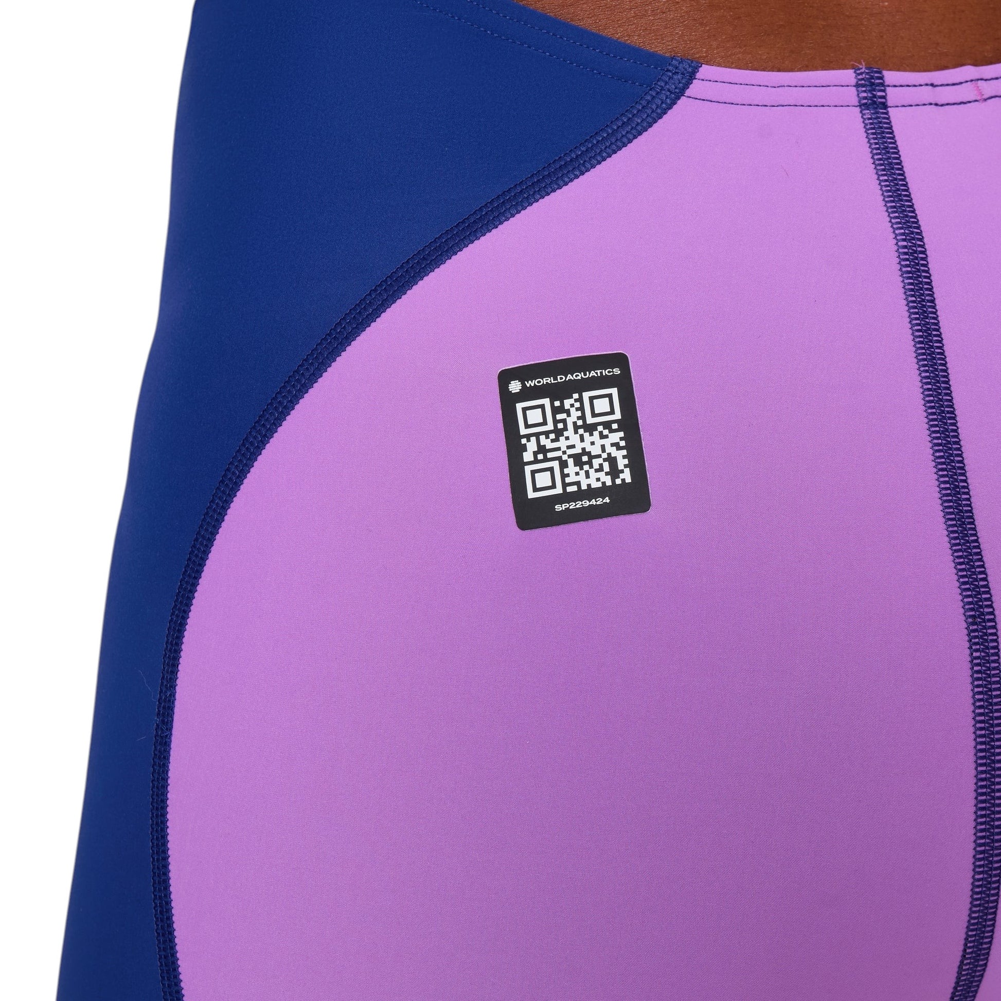 Speedo LZR Pro 2.0 Kneeskin Open Back: Close-up of rear panel. Navy and lavender fabric panels featuring the official World Aquatics approved QR code logo.
