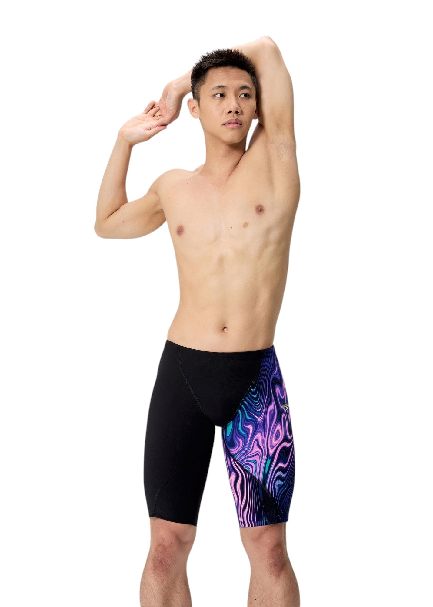 Speedo Men's LZR Pro 2.0 Jammer: Front view on model. Black base with an asymmetric purple and blue swirling psychedelic pattern on the left leg.